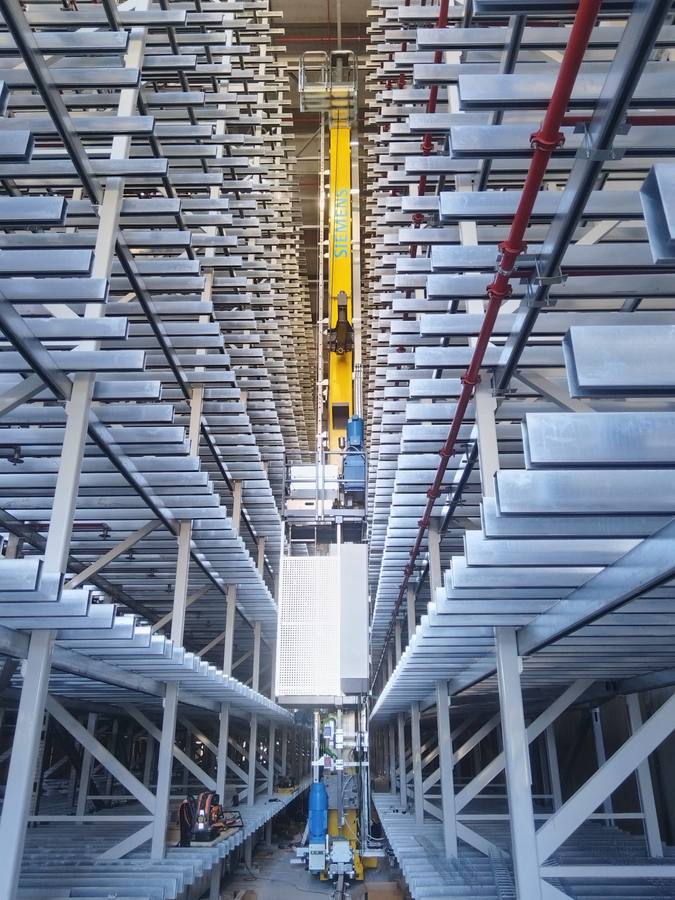 High-bay automated warehouse with stacker crane